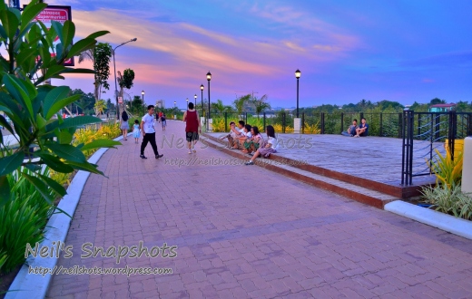 People hangout, enjoy the view, jog and walk at the Iloilo RIver Esplanade in Iloilo City. 